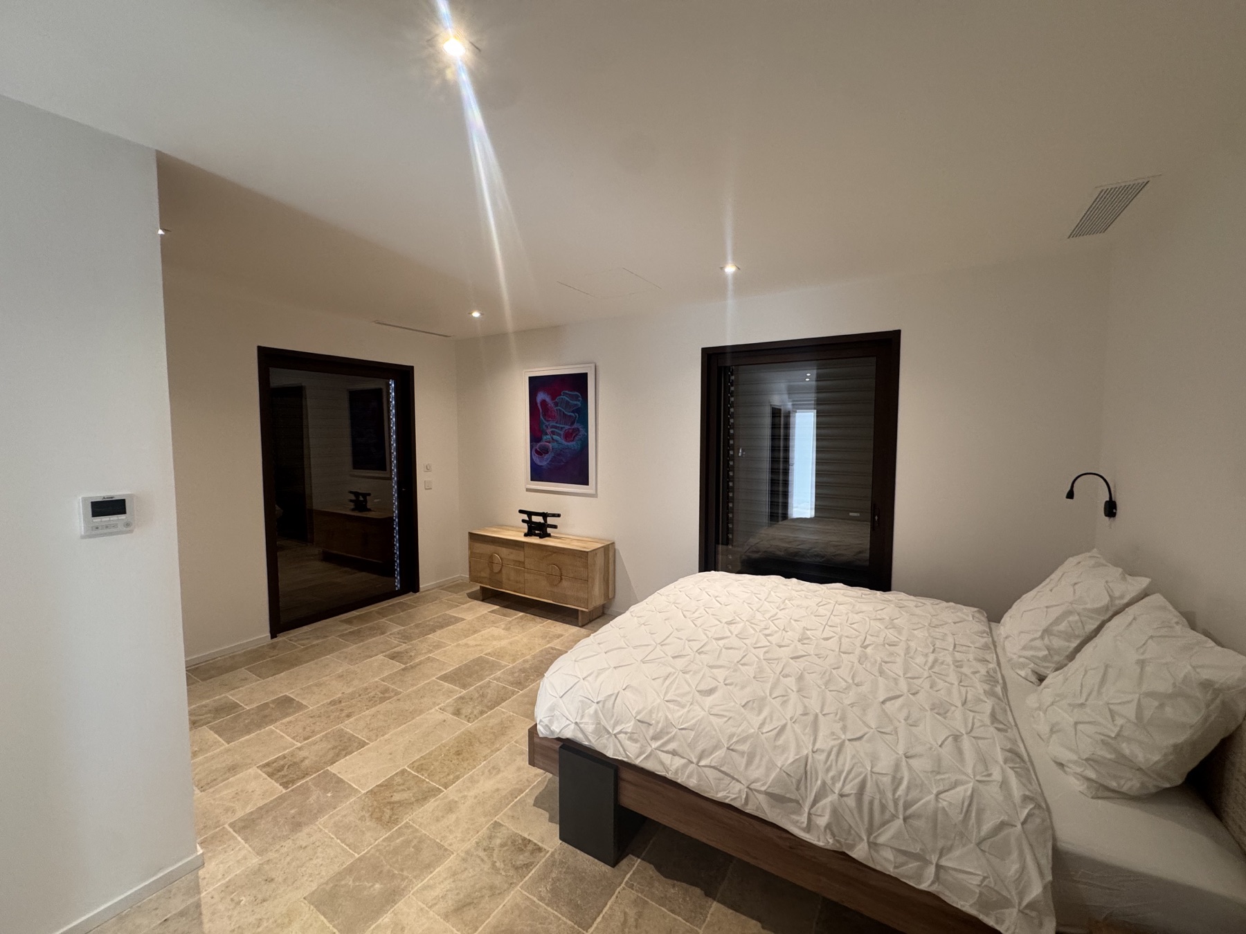 Climatisation gainable basse pression dans une chambre à Port d’Alon